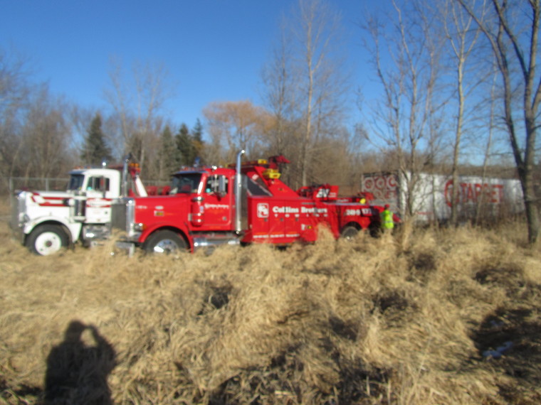 Collins Brothers TowingTrebron wrecker doing an icy recovery Tow411